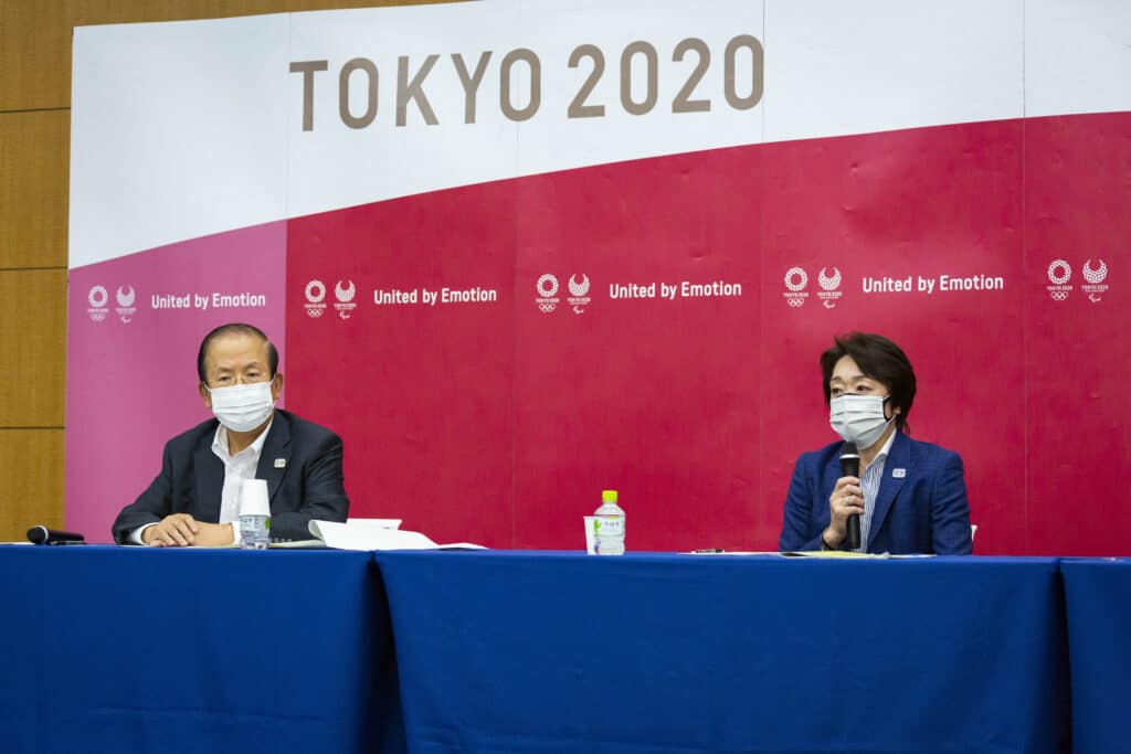 The top medical adviser to the Japanese government says the safest way to hold the Tokyo