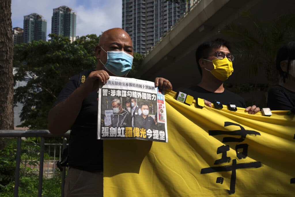A Hong Kong court ordered the top editor of pro-democracy newspaper Apple Daily