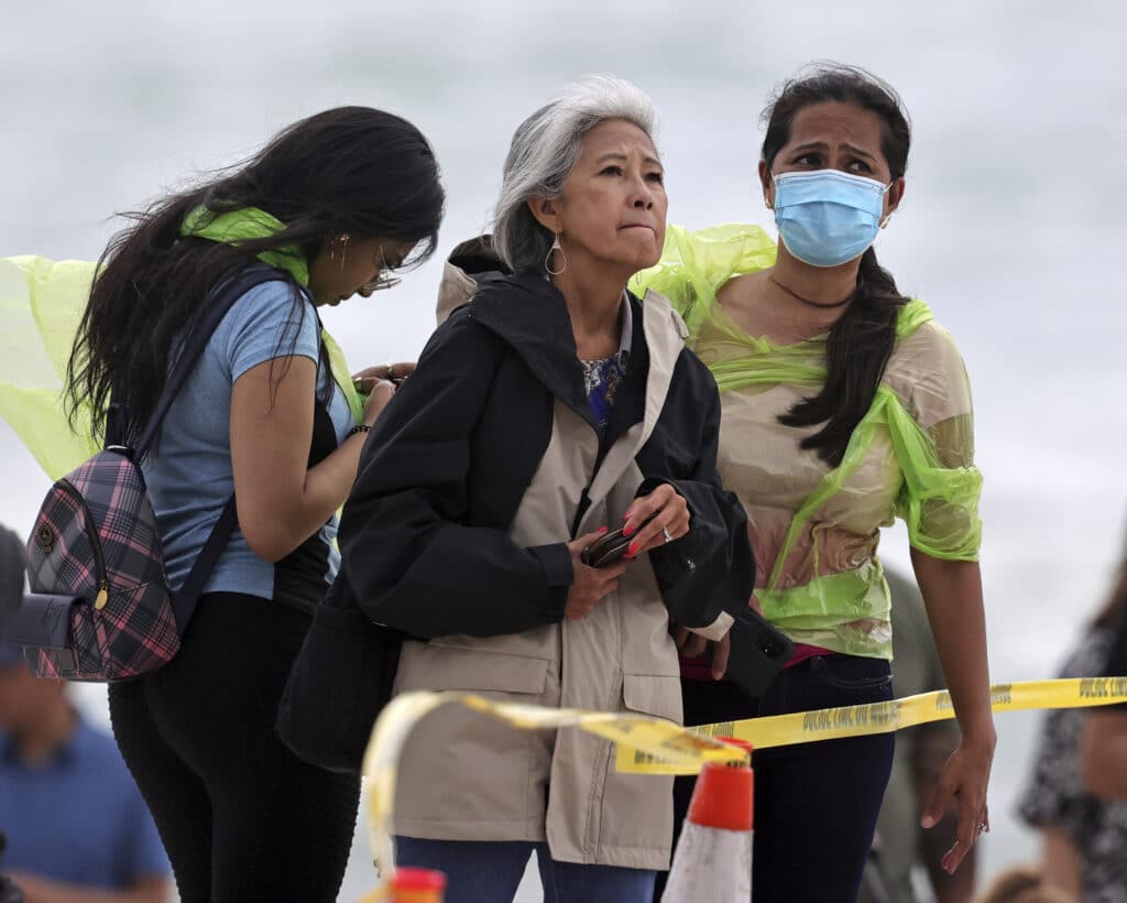 The torturous wait for word of nearly 160 people unaccounted for after an oceanfront