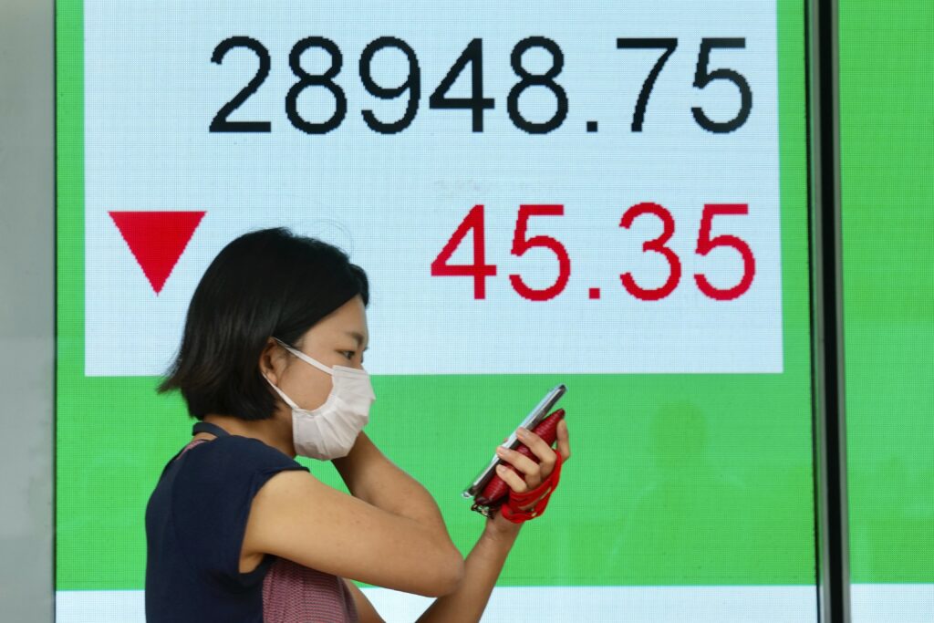 Shares are mixed in Europe and Asia after the release of data showing Asian
