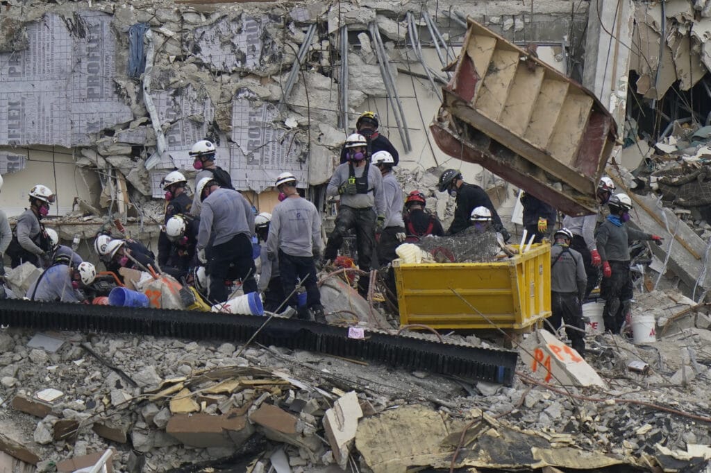 Four more bodies have been found in the rubble of a collapsed Florida condo tower