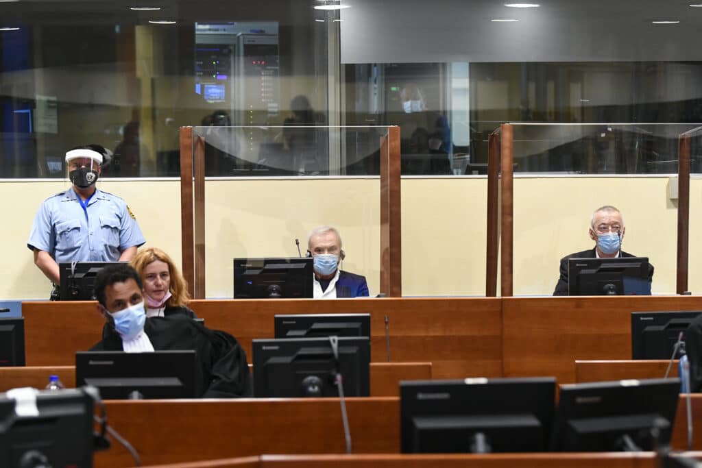 A United Nations court on Wednesday convicted two former allies of late Serbian President