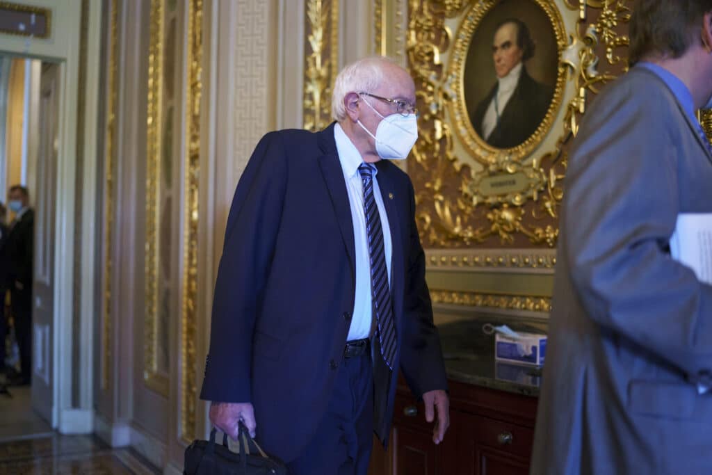 Senate Budget Committee Chairman Bernie Sanders, I-Vt., arrives as the Senate
