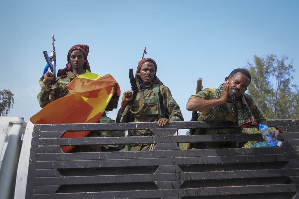 June 29, 2021 file photo, Tigray forces ride in a truck after taking control of Mekele