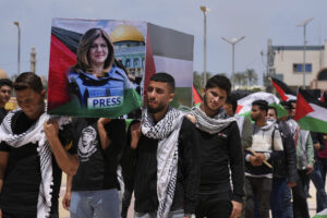 Family of journalist killed in West Bank lashes out at Biden