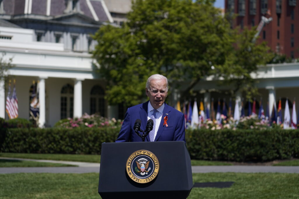 Biden celebration of new gun law clouded by latest shooting