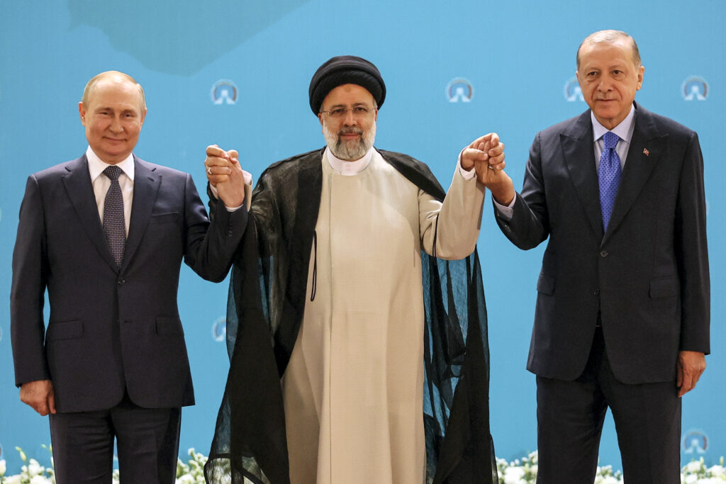 Putin, in Tehran, gets strong support from Iran over Ukraine
