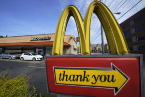 McDonald's reports lower Q2 sales, charges weigh down profit