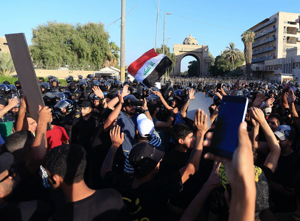 Followers of cleric enter Iraqi parliament in show of force