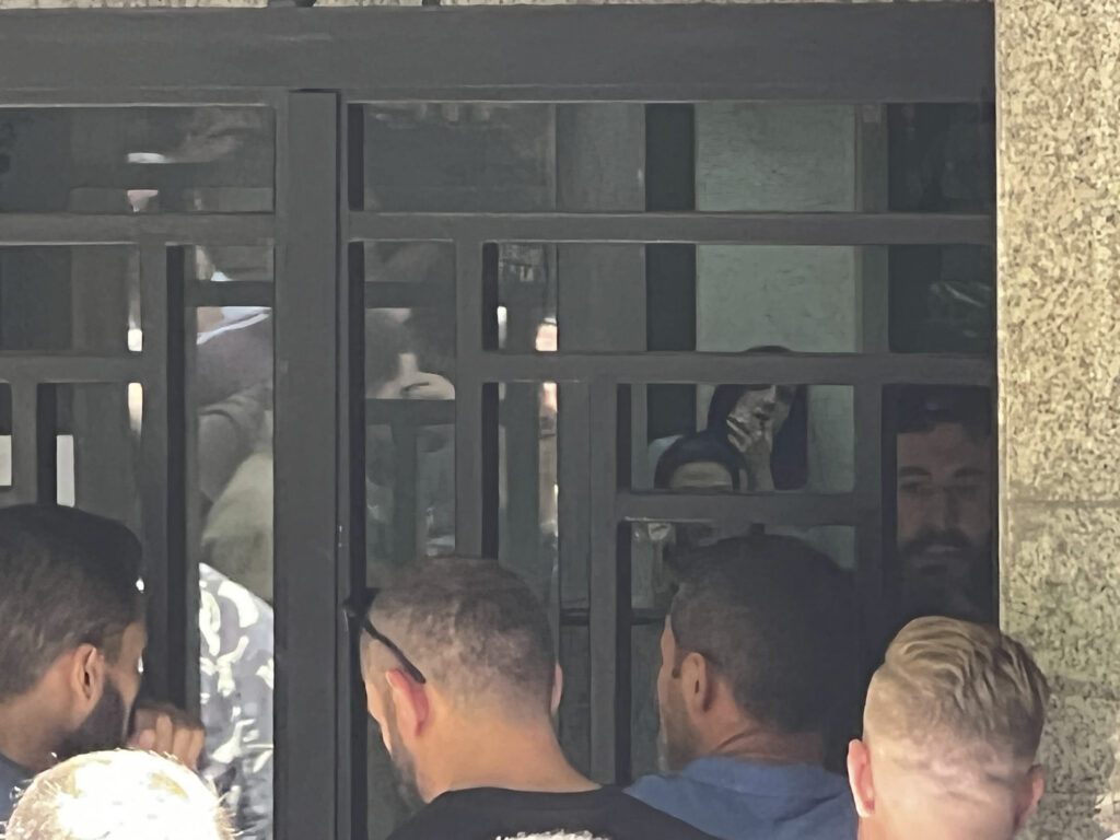 Armed man demanding savings takes Beirut bank staff hostage