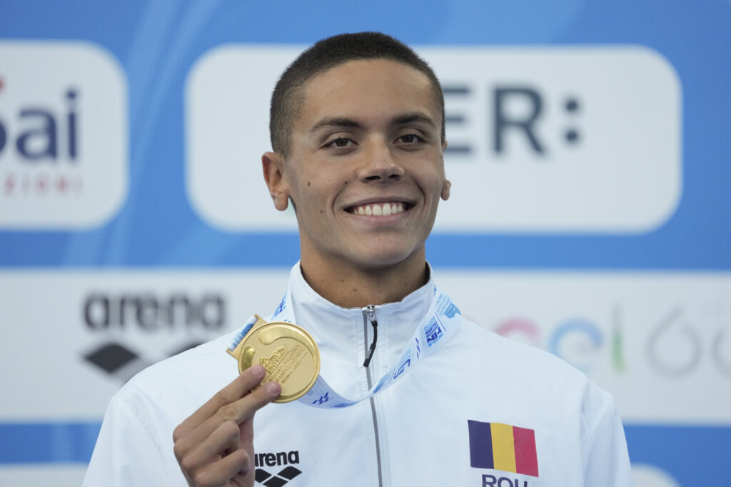 Romanian teen swimmer Popovici breaks 2009 in 100 free