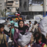 Israel Allows Aid Trucks into Gaza Amid Pressure