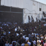 Desperate Palestinians Storm UN Aid Warehouse, Four Dead
