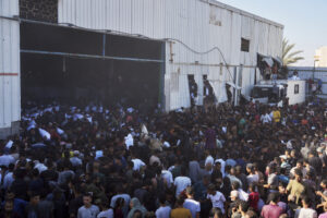 Desperate Palestinians Storm UN Aid Warehouse, Four Dead