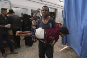 Gaza Aid Site Gunfire, Airstrikes Kill 74 Palestinians