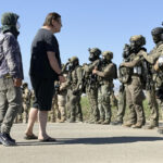 Law Enforcement Masks Fuel Immigration Enforcement Debate
