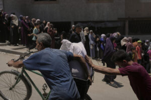 59 Palestinians Killed in Gaza Aid, Airstrikes