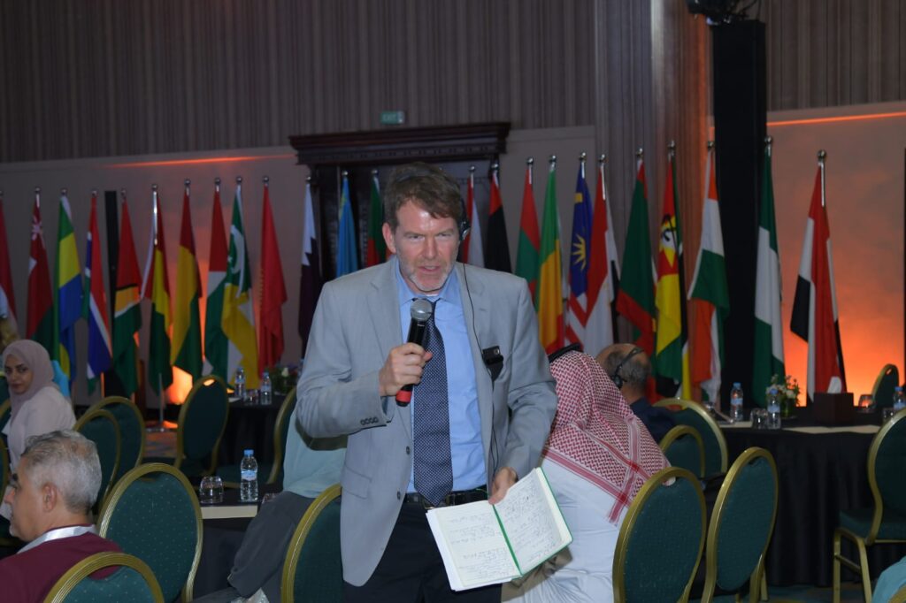 Mark Pfeifle moderates a youth panel at OIC in Marrakesh